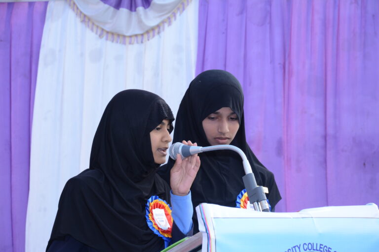 2 girls reciting tarana of Investiture ceremony at Shahbaaz school and PU college Gulbarga