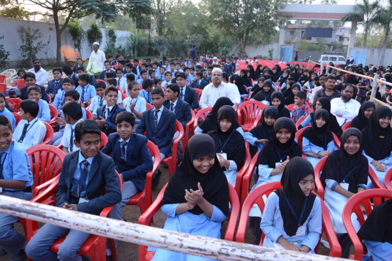 Students sitting in chairs during Tarana release of Investiture ceremony at Shahbaaz school and PU college Gulbarga