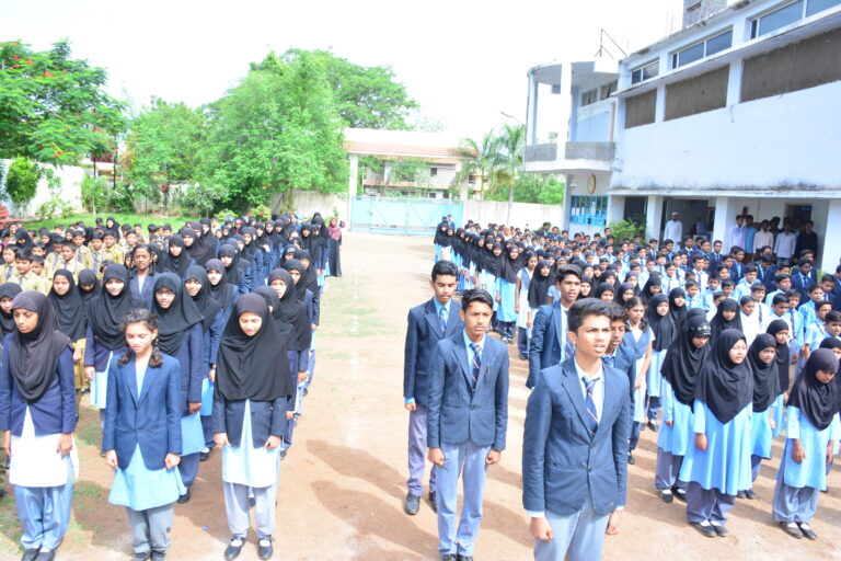 Students on Shahbaaz school and PU college in an assembly