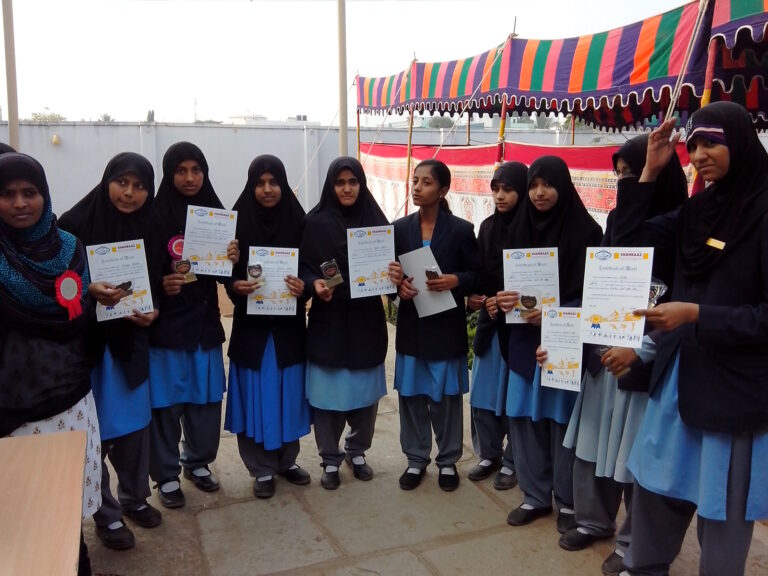 Girls with their certificate at Science exhibition at Shahbaaz school and PU college