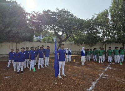 House Blue Sports Representatives in the Shahbaaz school playground behind the school building.